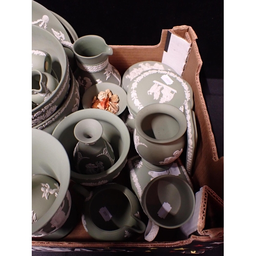 108 - A COLLECTION OF WEDGWOOD GREEN JASPER ORNAMENTS AND TABLEWARES

including biscuit barrels, bowls, di... 