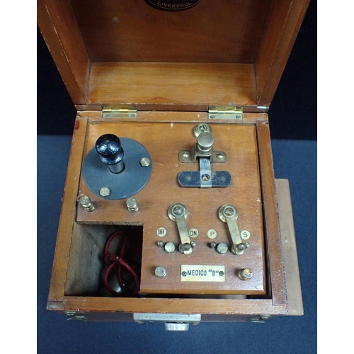 109 - AN EARLY 20TH CENTURY 'MEDICO B' ELECTRIC SHOCK BOX

with printed label for Chas. Aronsberg, Opticia... 