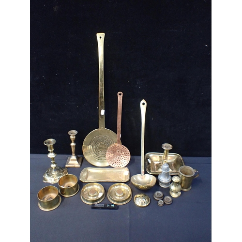 114 - A PAIR OF 'TRENCH ART' ASHTRAYS

mounted with (worn) coins, a petal-foot candlestick, and other meta... 