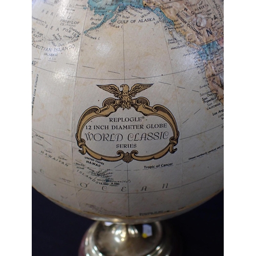 123 - A REPLOGLE 12 INCH DIAMETER GLOBE

World Classic series, with mahogany and brass stand