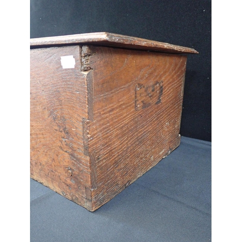 125 - AN 18th CENTURY OAK BOX

with iron lock and hinges 60.5cm wide