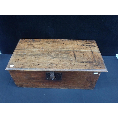 125 - AN 18th CENTURY OAK BOX

with iron lock and hinges 60.5cm wide