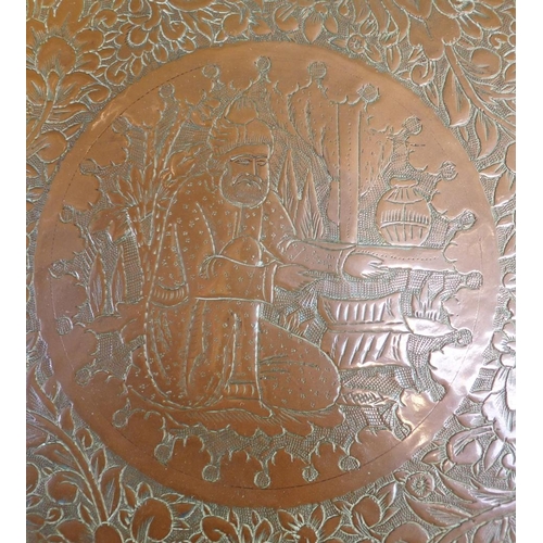 134 - A LARGE PERSIAN SILVERED COPPER TRAY, WITH ALL OVER DECORATION

depicting figures and beasts within ... 