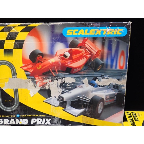 182 - A SCALEXTRIC GRAND PRIX SET C1047

team Shell F1 No.3 v. Team Firestone F1 No.4 (both cars damaged a... 