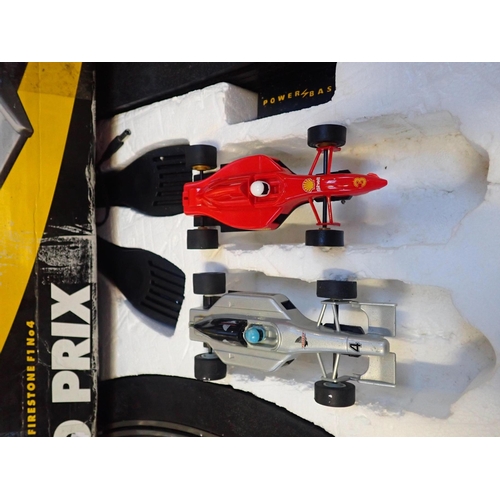 182 - A SCALEXTRIC GRAND PRIX SET C1047

team Shell F1 No.3 v. Team Firestone F1 No.4 (both cars damaged a... 