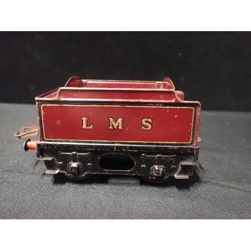 199 - HORNBY 0 GAUGE No.1 SPECIAL 0-4-0 LOCOMOTIVE AND TENDER

LMS livery, clockwork, good condition