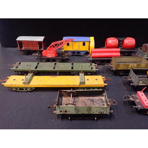 203 - A COLLECTION OF HORNBY 0 GAUGE GOODS WAGONS

mostly played with