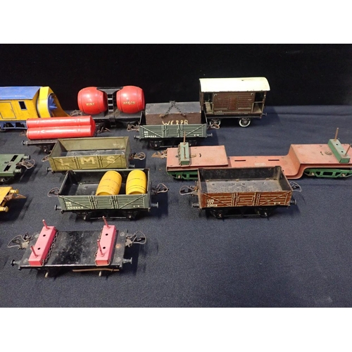 203 - A COLLECTION OF HORNBY 0 GAUGE GOODS WAGONS

mostly played with