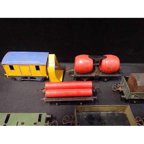 203 - A COLLECTION OF HORNBY 0 GAUGE GOODS WAGONS

mostly played with