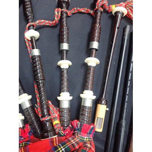 211 - A SET OF CASED 20TH CENTURY BAGPIPES

in turned darkwood and white metal furrules, moulded soles, no... 