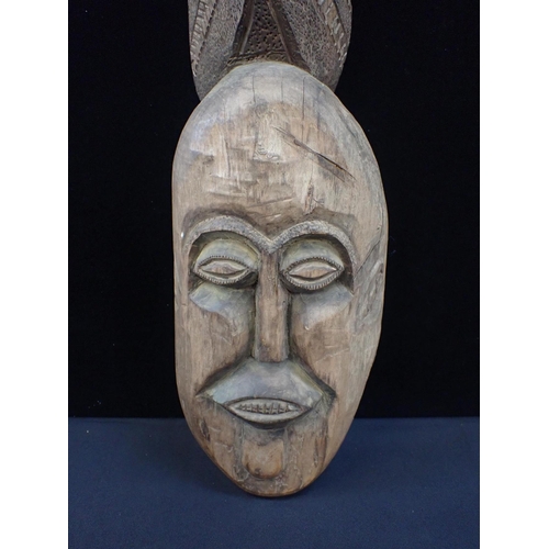 236 - AN AFRICAN MASK WITH TALL COIFFURE CREST

78cm high