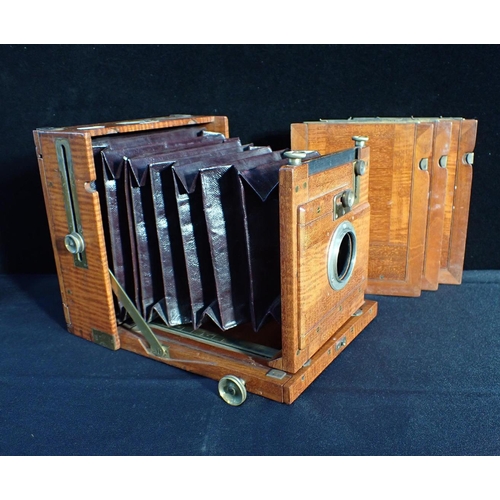 256 - AN ANTIQUE MAHOGANY BELLOWS PLATE CAMERA BODY

(no lens) by Perken, Son and Rayment, Hatton Garden, ... 