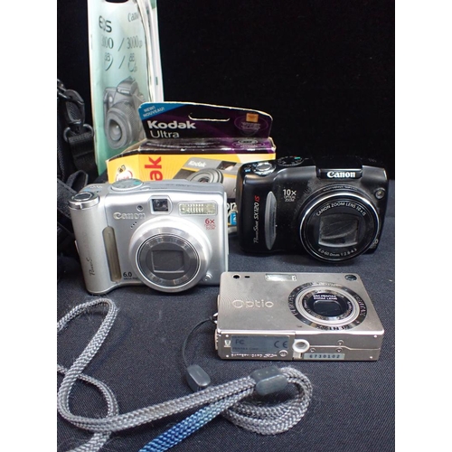 269 - FIVE CAMERAS

a Canon 'PowerShot SX30 IS', a Canon 'PowerShot SX120 IS', a Canon 'PowerShot A700', a... 