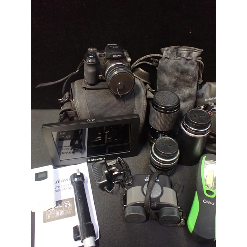 271 - A NIKON F-301 CAMERA WITH PHOTAX OPTOMET LENS

a PROMURA C.P. Hi-lux lens, and other lenses and equi... 