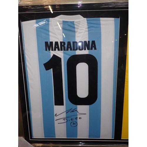 274 - 'PELE' AND 'MARADONA' DOUBLE PRESENTATION FRAMED SIGNED SHIRTS

Two of the worlds greatest ever foot... 