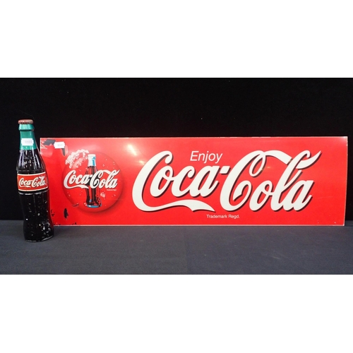 29 - A COCA-COLA ADVERTISING BOTTLE-SHAPED FRIDGE HANDLE

and perspex advertising sign (wear)