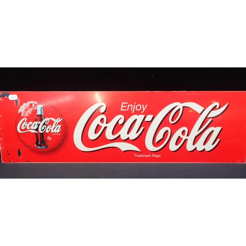 29 - A COCA-COLA ADVERTISING BOTTLE-SHAPED FRIDGE HANDLE

and perspex advertising sign (wear)