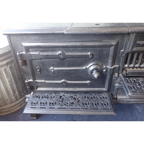 3 - A CAST IRON KITCHEN RANGE 'THE BELLE'

by Willis of Bournemouth, Parkstone, Broadstone 91cm wide, ho... 