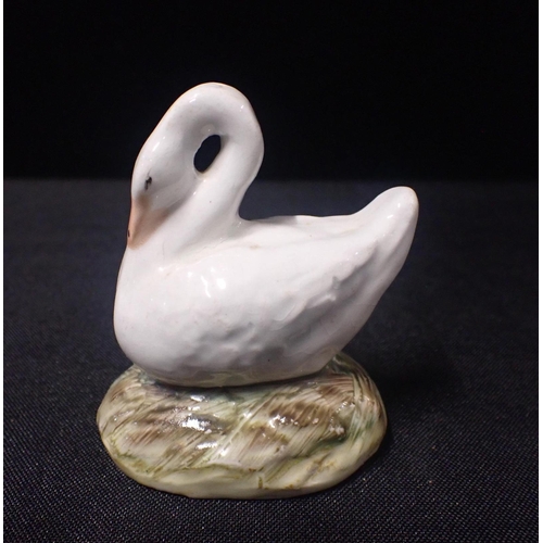 303 - COLIN MELBORNE 'BEWICK' 1960's WHITE BODY DOVE

with chalk decoration and a Staffordshire swan (2)