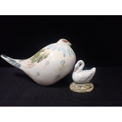 303 - COLIN MELBORNE 'BEWICK' 1960's WHITE BODY DOVE

with chalk decoration and a Staffordshire swan (2)