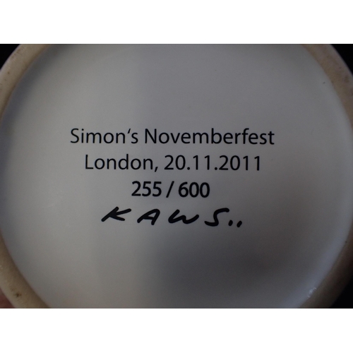 307 - 'KAWS..' (AMERICAN B.1974: A LIMITED EDITION BEER MUG

stamped 'Simon's Novemberfest, London, 20.11.... 