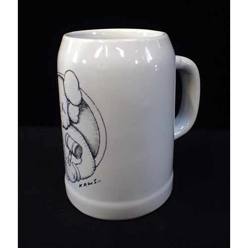 307 - 'KAWS..' (AMERICAN B.1974: A LIMITED EDITION BEER MUG

stamped 'Simon's Novemberfest, London, 20.11.... 