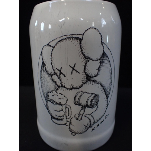 307 - 'KAWS..' (AMERICAN B.1974: A LIMITED EDITION BEER MUG

stamped 'Simon's Novemberfest, London, 20.11.... 