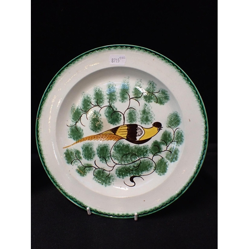 311 - THREE EARLY 19TH CENTURY 'PEAFOWL' PEARLWARE PLATES

decorated in brown and yellow amongst sponged g... 