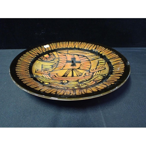 318 - LARGE POOLE POTTERY AEGEAN DISH

painted with a ship design, 41 cms diam