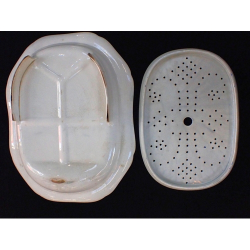 332 - A BLUE AND WHITE 'GOTHIC CASTLE' MEAT DISH AND MATCHING DRAINER

with gravy well, possibly Spode, bu... 