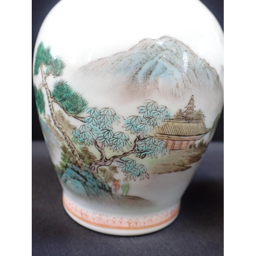 338 - A PAIR OF CHINESE VASES, PAINTED IN ENAMELS

with landscapes, 20th century, marked to base, 20cm hig... 