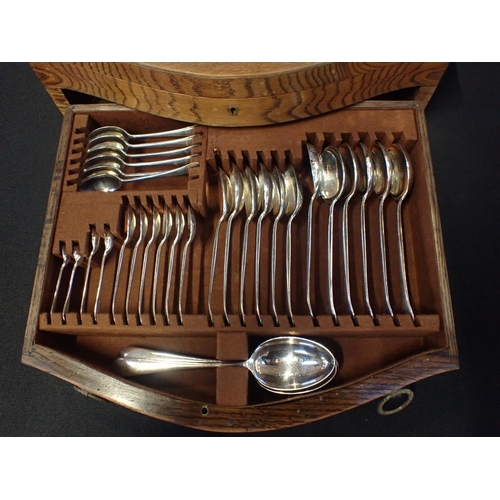 358 - AN OAK-CASED SILVER-PLATED CANTEEN