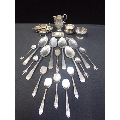 361 - A SET OF FOUR PLATED SALTS WITH SPOONS

with a quantity of plated wares