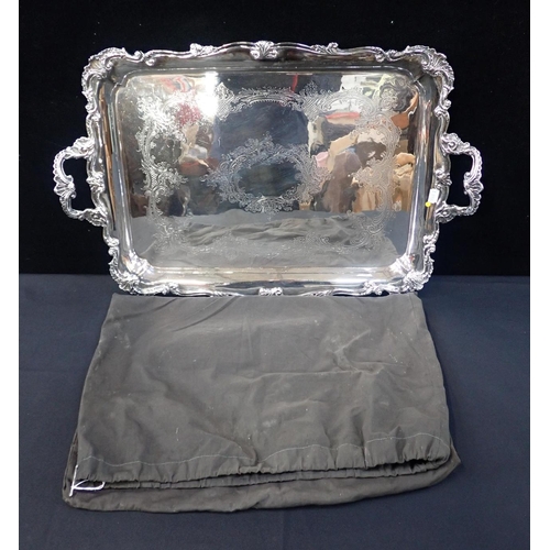 362 - A VICTORIAN SILVER PLATED TWO HANDLED TRAY

with raised Rococo border and engraved centre 65 x 43cm,... 