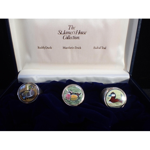 371 - A SET OF SILVER AND ENAMEL PETER SCOTT WILDFOWL TRUST PILL BOXES

cased, with Peter Scott signed cer... 