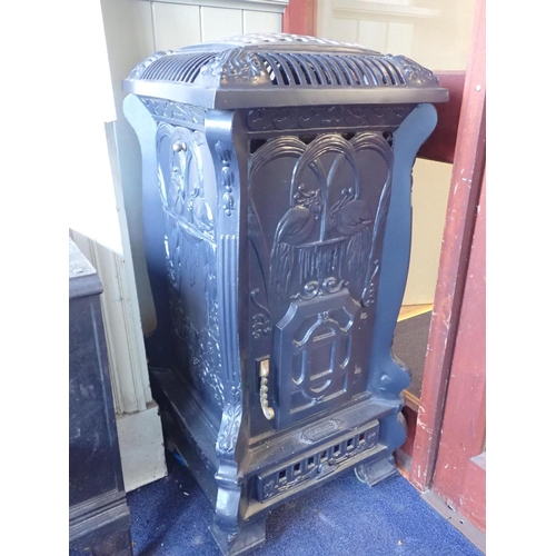 4 - A 'LA FONTAINE' BELLE EPOQUE STYLE CONSERVATORY HEATER

cast metal, on castors, gas bottle fired 95c... 