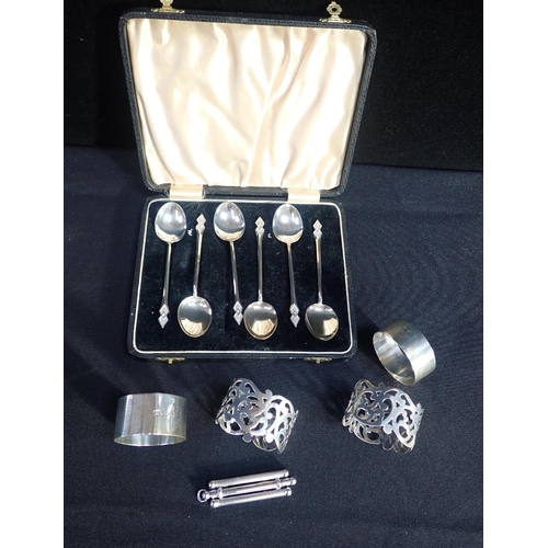 401 - A MINIATURE SILVER COCKTAIL WHISK

a cased set of George V silver spoons, and napkin rings