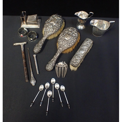 402 - A QUANTITY OF SILVER AND WHITE METAL WARE

including hairbrushes, a cigar cutter/match holder, a par... 