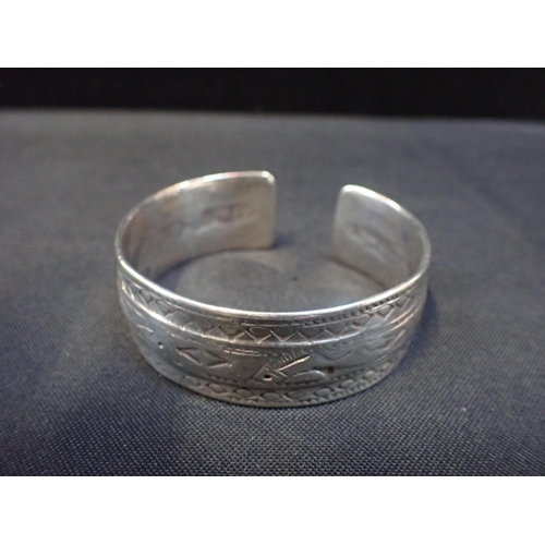 414 - A SILVER BANGLE

Indian or Middle Eastern