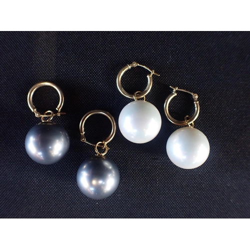 422 - TWO PAIRS OF NIGHT AND DAY FAUX PEARL EARRINGS