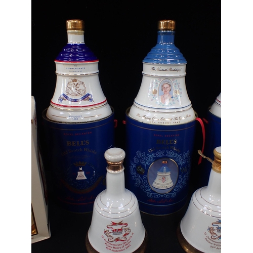 44 - SEVEN BELL'S WHISKY COMMEMORATIVE DECANTERS

some boxed (7)