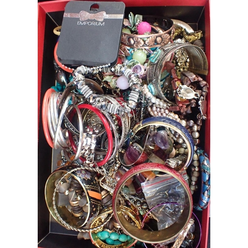 443 - A QUANTITY OF COSTUME JEWELLERY AND WATCHES

bracelets, bangles, beads and metal chains etc