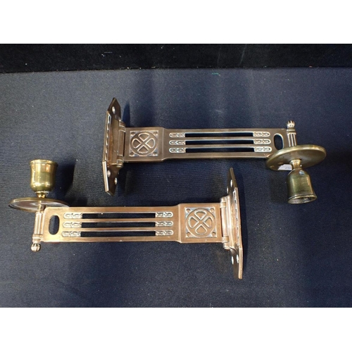 50 - A PAIR OF EARLY 20TH CENTURY GERMAN 'JUGENSTIL' BRONZED METAL SCONCES

each 12cm high x 22cm long, a... 