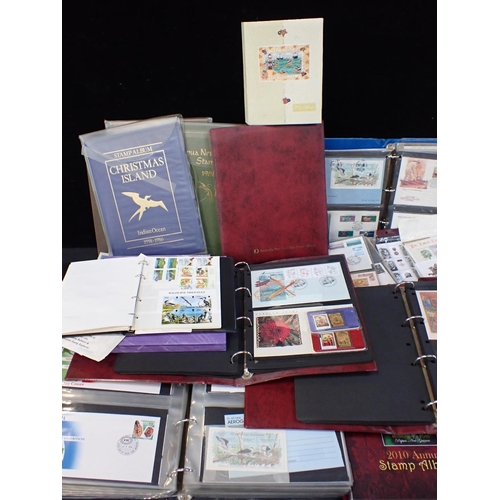 502 - TWENTY ALBUMS OF STAMPS AND FIRST DAY COVERS

mostly Papua New Guinea, together with some loose (one... 