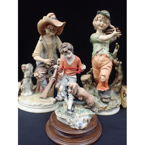 52 - A PAIR OF CAPODIMONTE PORCELAIN FIGURES - THE TAILOR AND THE COBBLER

together with three other simi... 