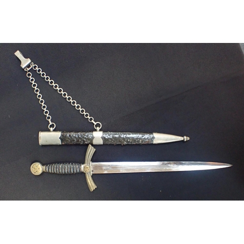 524 - A LUFTWAFFE DRESS DAGGER

with scabbard and chain (surface wear to scabbard, worn plating)

Note: Yo... 