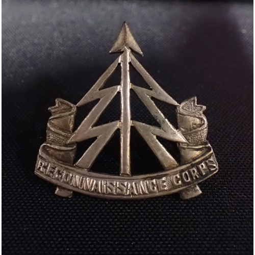 530 - RECONNAISSANCE CORPS: A SILVER BADGE

by Gaunt, London, with pin fastening, other metal RC badges by... 