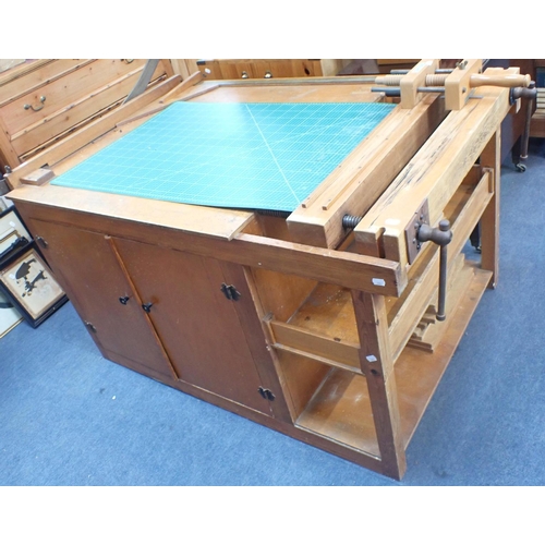 68 - A BOOKBINDING WORKBENCH, FITTED DOUBLE DOORS

and integral tub, with laying press and Dryad plough, ... 