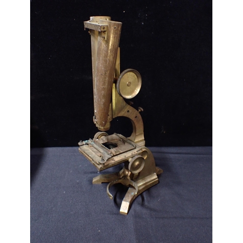 69 - A BRASS MICROSCOPE BY M. PILLISCHER, LONDON No. 998

in mahogany case (a/f)