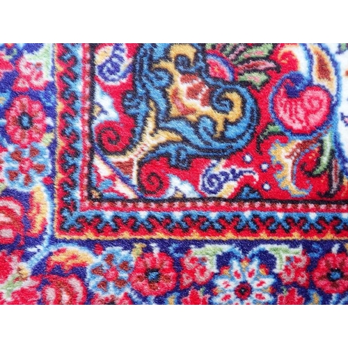 738 - A SMALL HAND KNOTTED PERSIAN RUG

in bright colours 72 x 105cm plus fringes, and another 84 x 107cm ... 